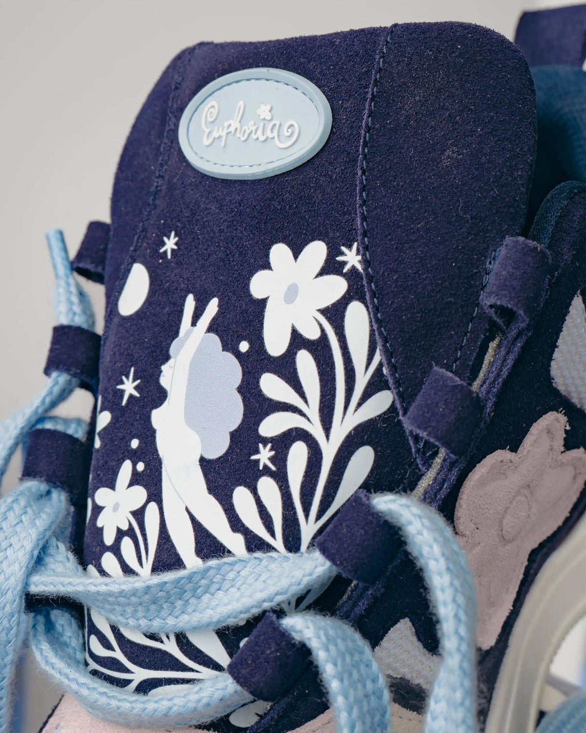Printed and embossed flowers on Italian suede. Handcrafted in Portugal.