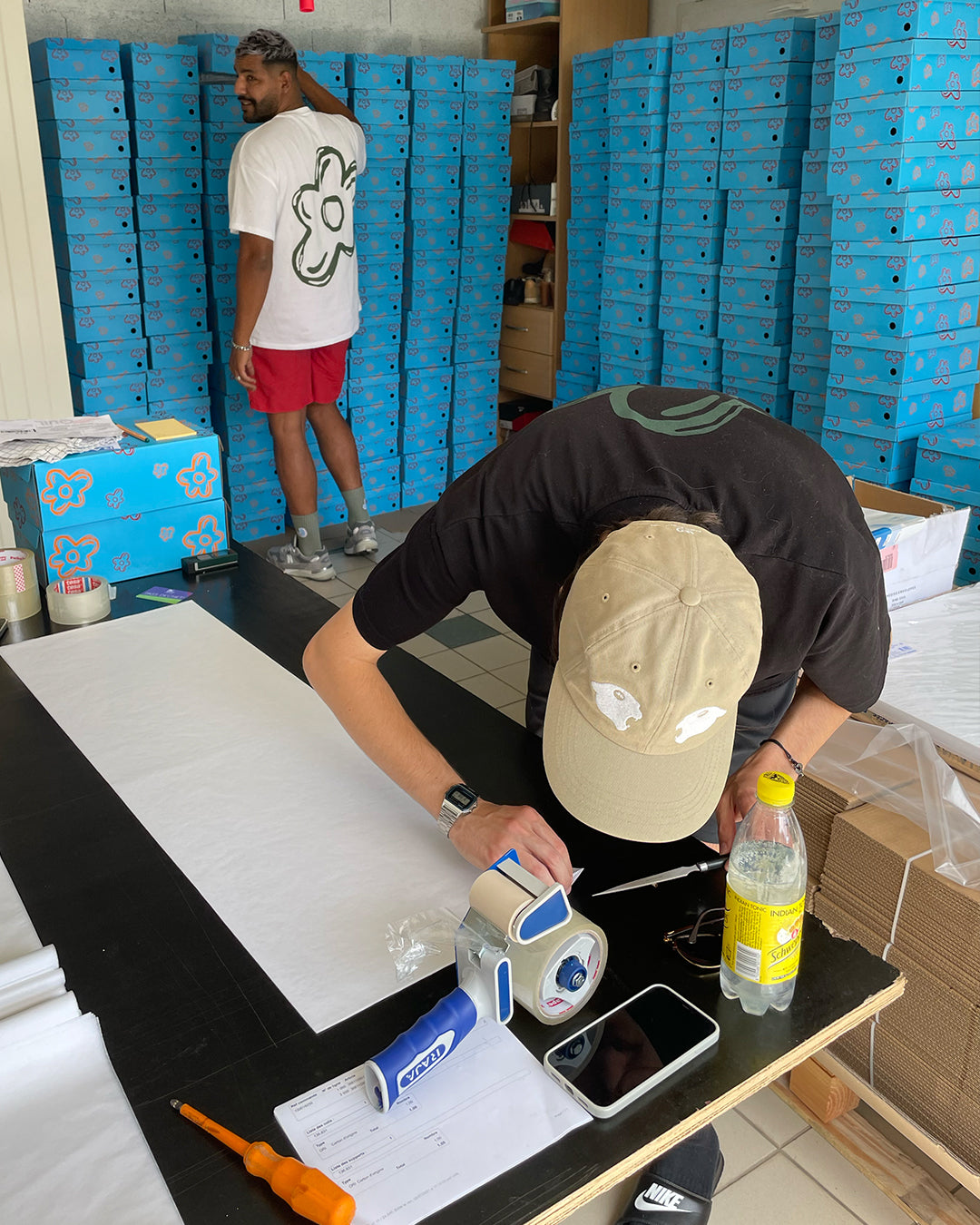 Flower Instincts team packing orders in the early days — Luxembourg