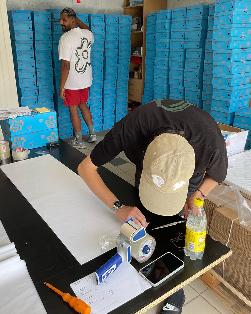 Flower Instincts team packing orders in the early days — Luxembourg